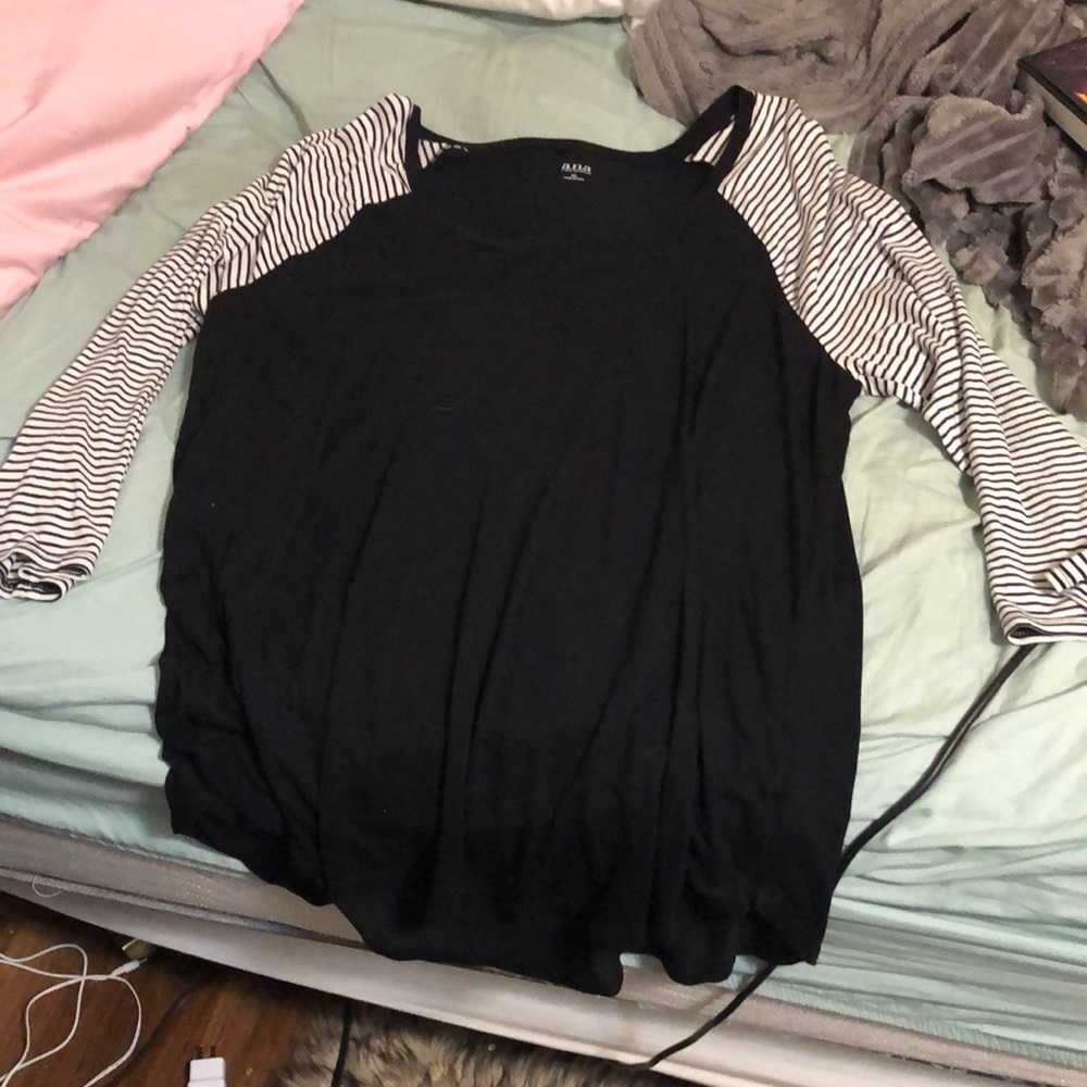 Black and white stripped sleeve shirt.